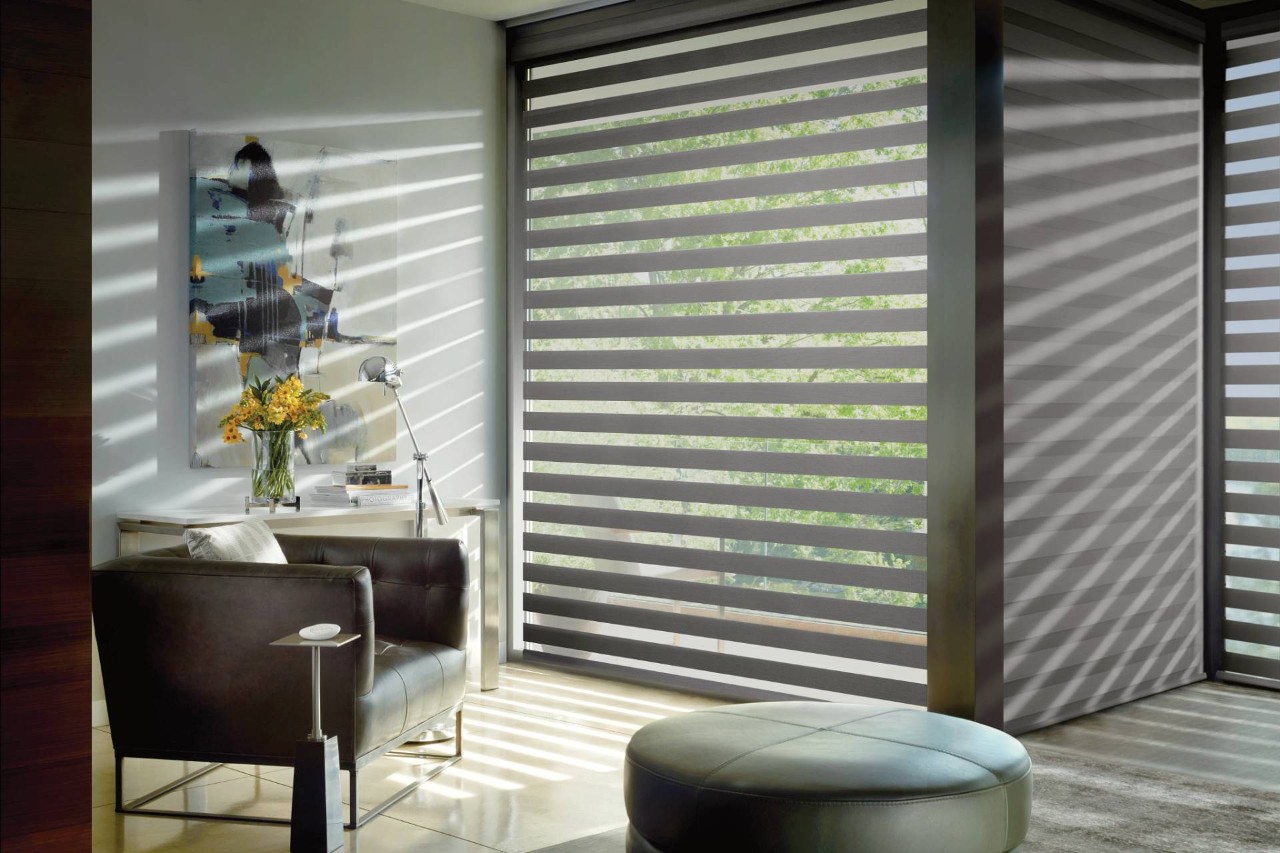 Hunter Douglas Designer Banded Shades decorating a home’s large windows near Scottsdale, AZ