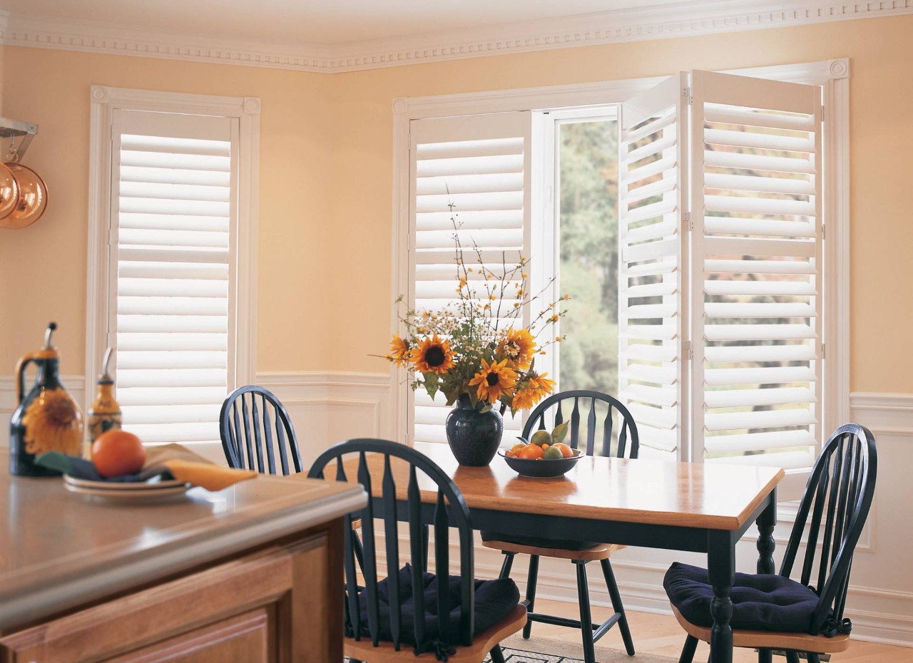 Hunter Douglas Palm Beach™ Polysatin™ Shutters installed in a beautiful home kitchen near Scottsdale, AZ